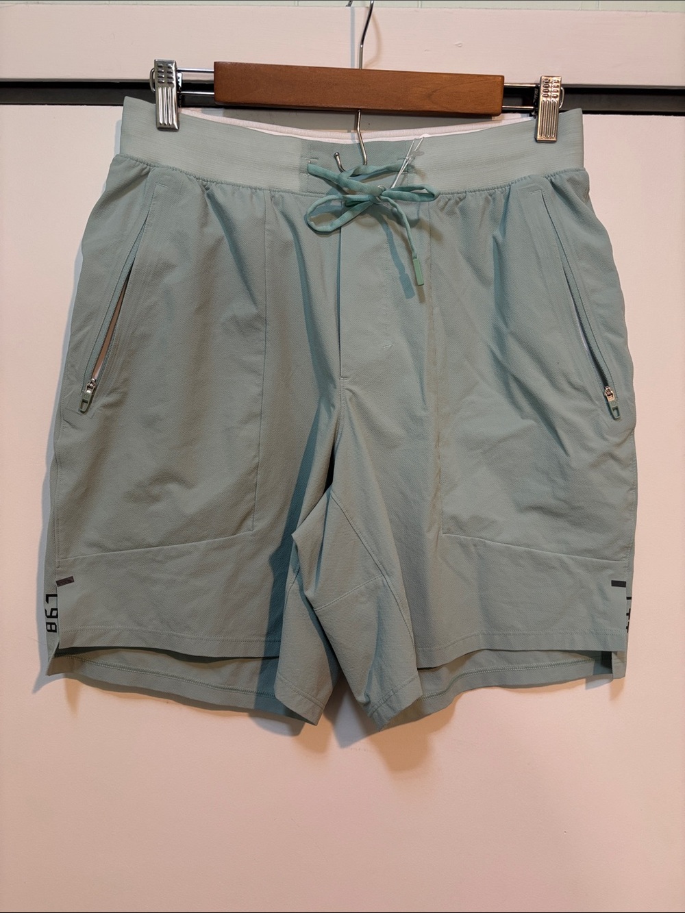 Lulu lemon license to train men’s mint short. Size tag cut out looks like m